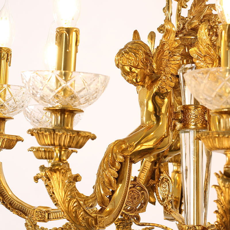 Close-up of ornate brass arm design in vintage chandelier.