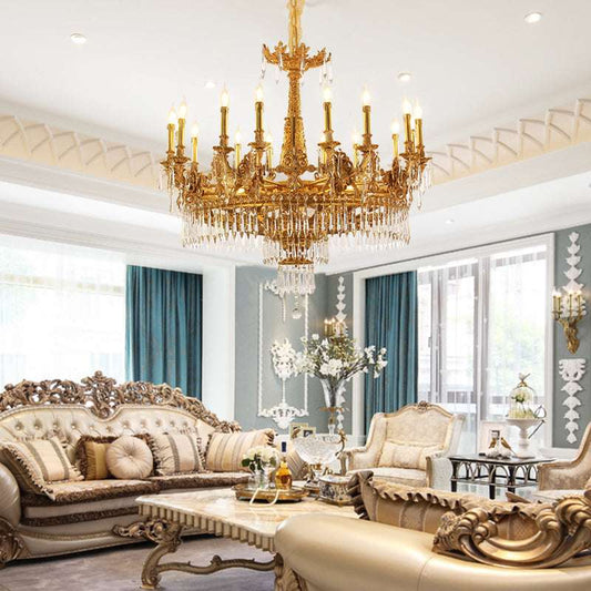 Ornate candle holders and bronze patterns on French vintage chandelier.