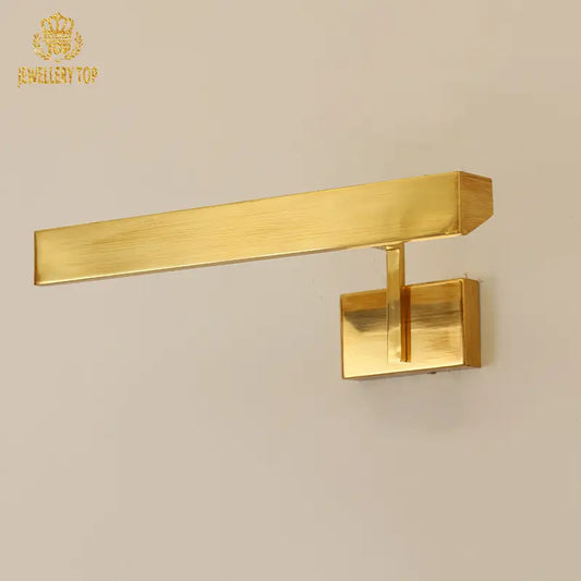 Adjustable gold wall lamp with satin brass finish