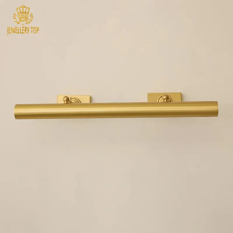 Classic brass picture wall lamp in warm lighting