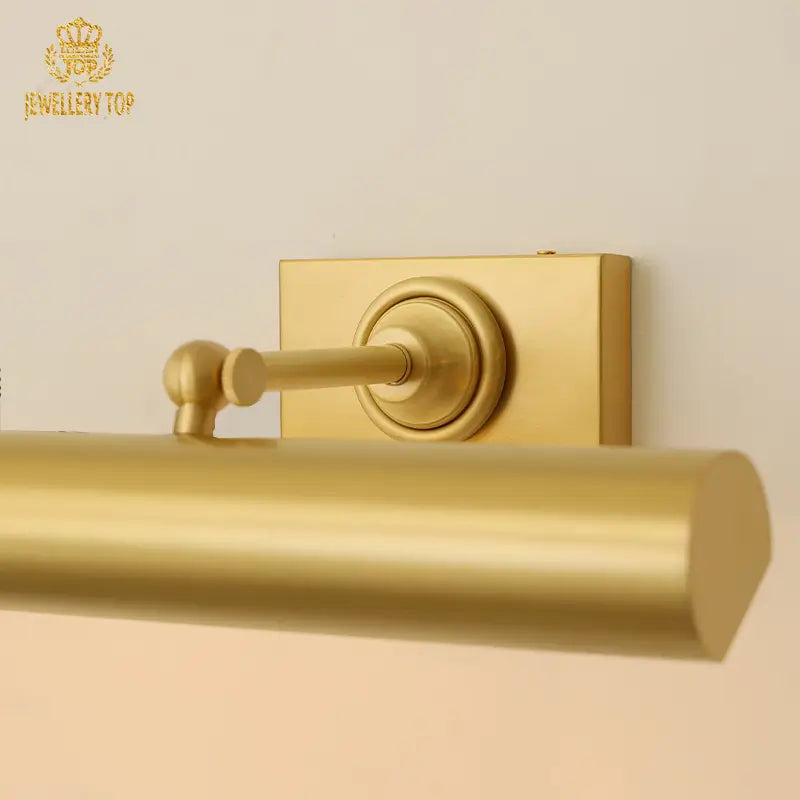 Matte gold wall lamp with cylindrical design