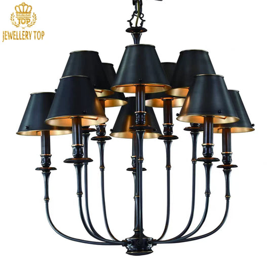 Baroque-inspired brass pendant light with urn-shaped center and scrolled accents