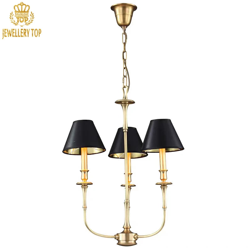 Dramatic black and gold lighting fixture for elegant dining spaces