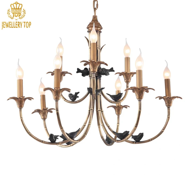 Antique-style brass pendant light with black avian motifs