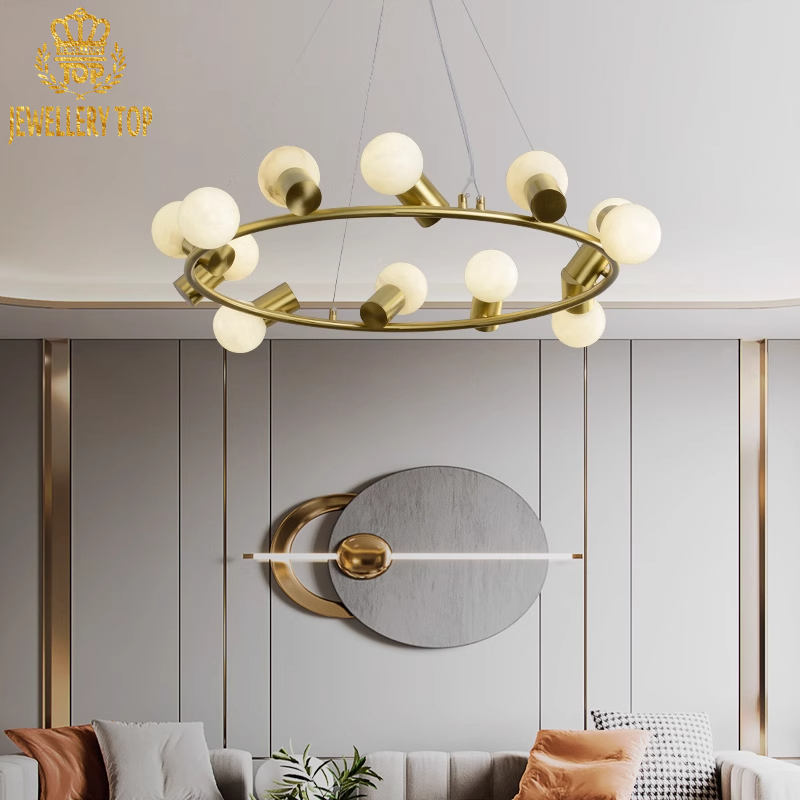 Gradient patina on brass framework contrasting with milky alabaster lighting