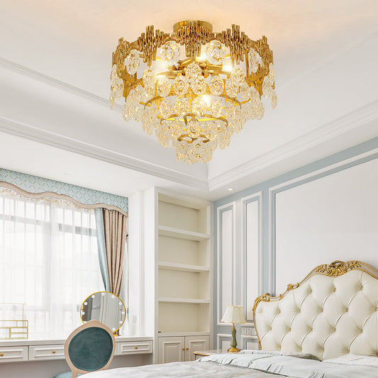Atlantis-inspired crystal ceiling lamp illuminating an elegant interior.