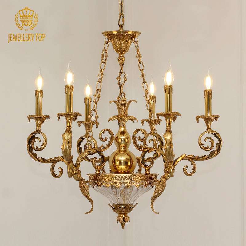 Neoclassical chandelier in polished brass with graceful scrolling arms.