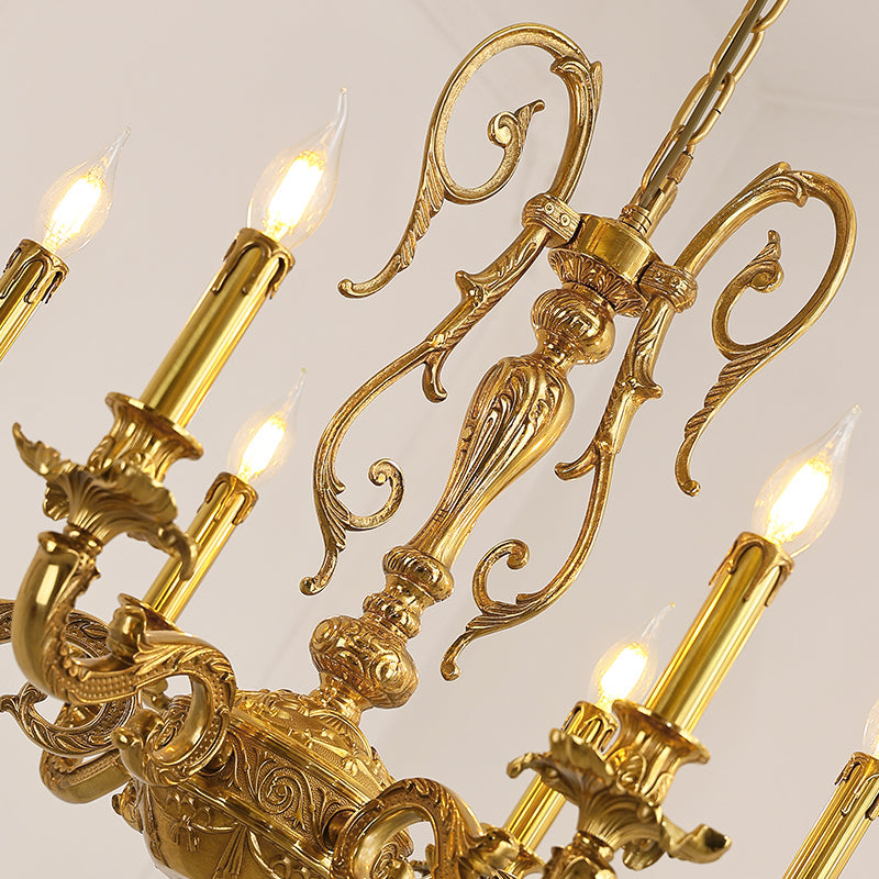 Close-up of ornate scrollwork on a neoclassical chandelier’s central column.
