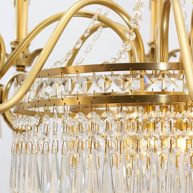 Close‑up of brass Victorian chandelier candle‑style socket detail