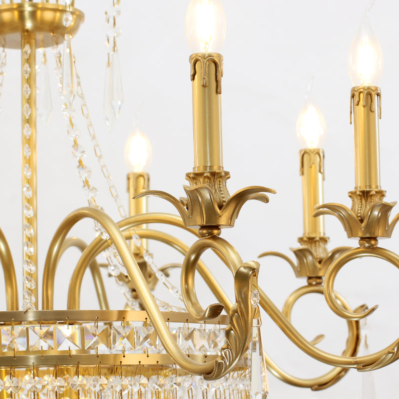 Detail view of sparkling crystal prisms hanging from brass frame