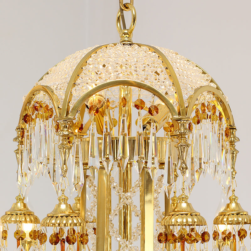 Illumination highlighting the chandelier’s classical design and shimmering crystals