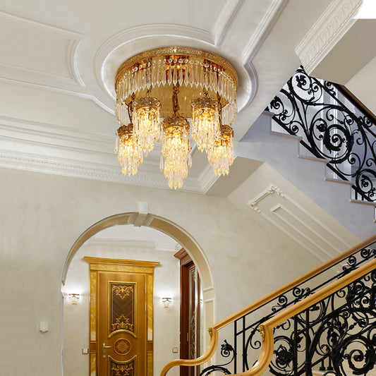 Elegant brass ceiling lamp illuminated, reminiscent of celestial beauty and classical mythology.