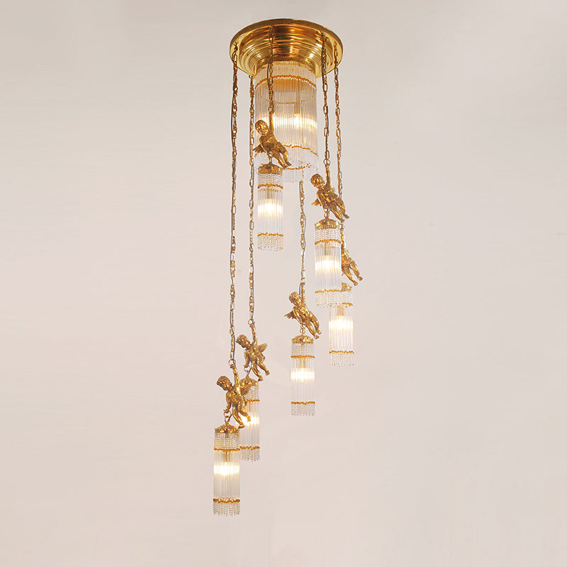 Artisan-crafted brass and glass chandelier illuminating a grand staircase