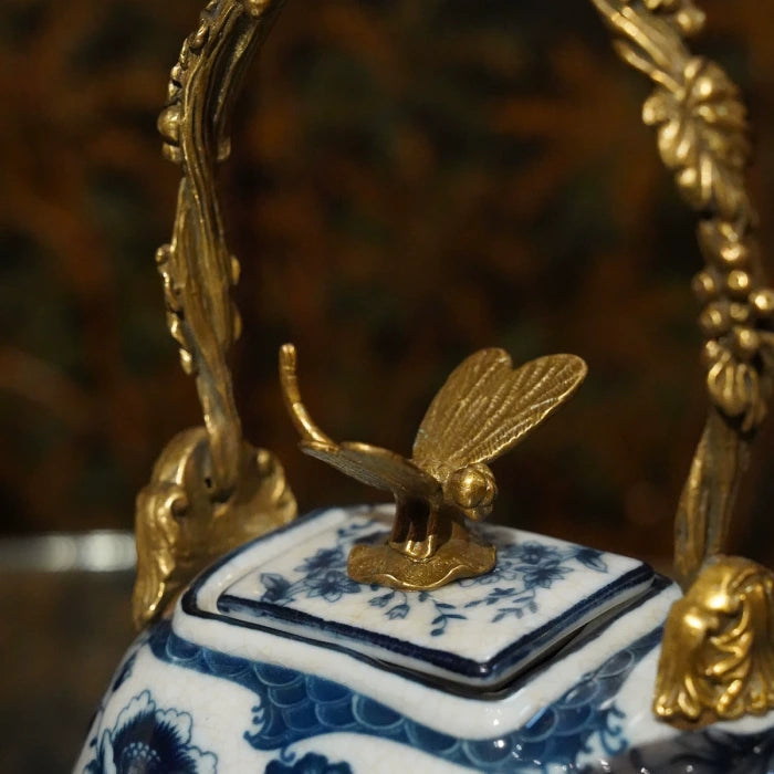 Close-up of the blue and white floral ceramic pattern on the elephant-shaped home decor.