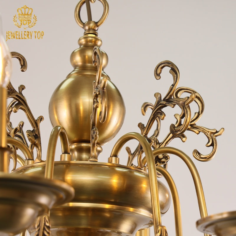 Antique Georgian chandelier chains and aged brass patina close-up