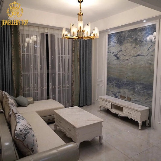 Smoky veined alabaster slabs suspended from Art Deco-inspired brass framework