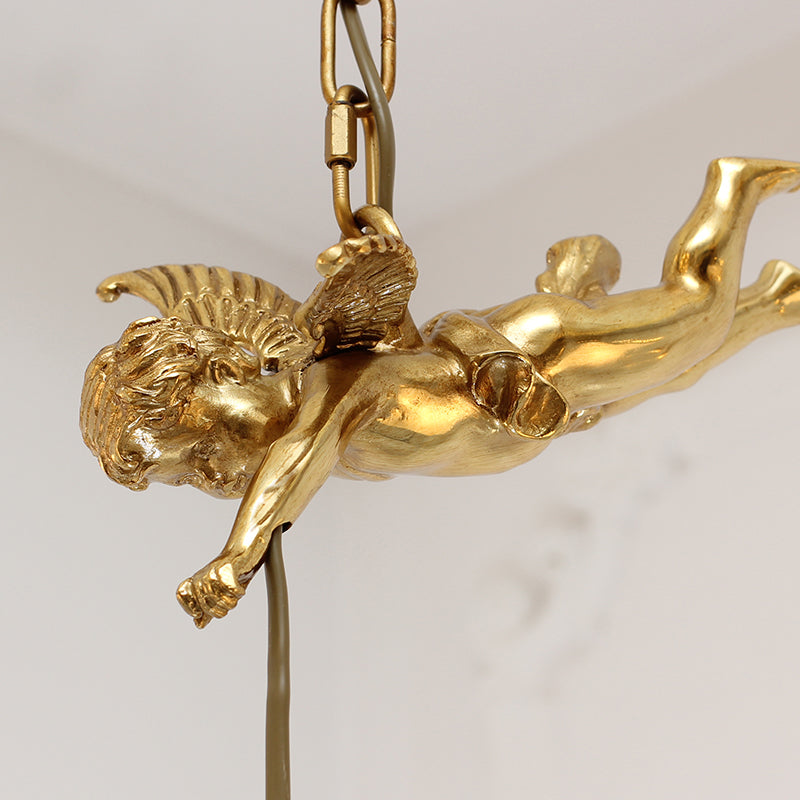 Close-up of Cupid's Victorian Enchantment Pendant Light brass detailing