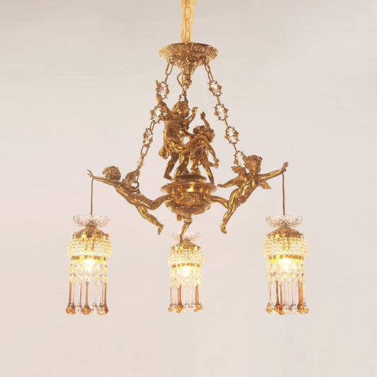 Ornate brass chain decorated with cherub motifs of the vintage luxury lighting fixture.