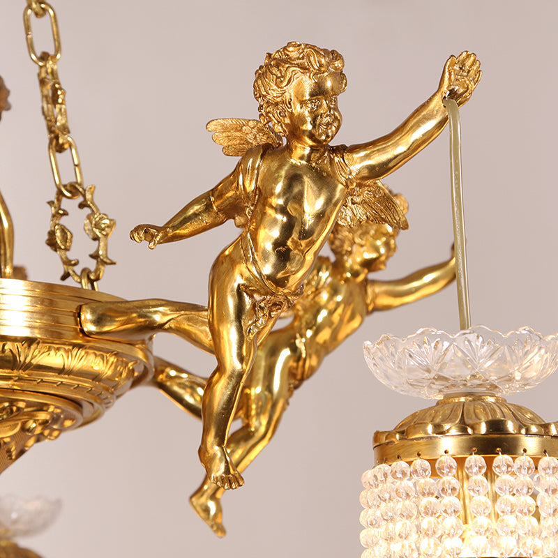 Intricate details of antique brass figures surrounded by luxurious glass elements.