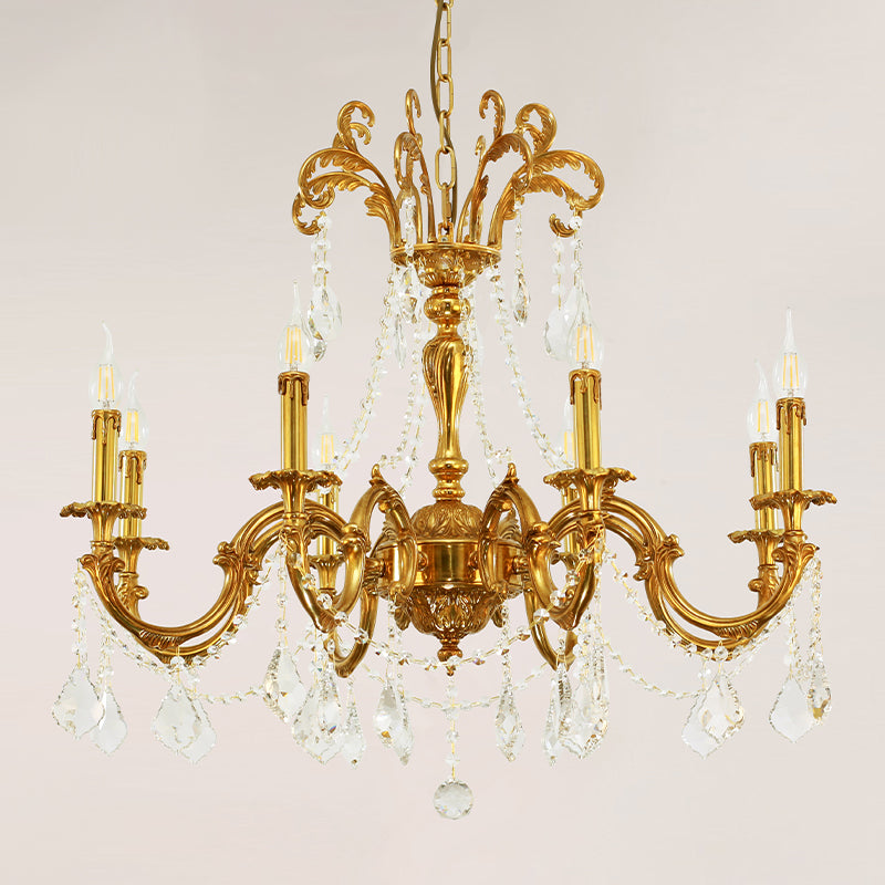 Candle-style bulbs illuminating a luxury chandelier with ornate design elements.