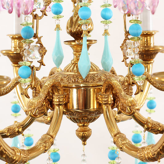 Detailed view of brass craftsmanship on farmhouse chandelier