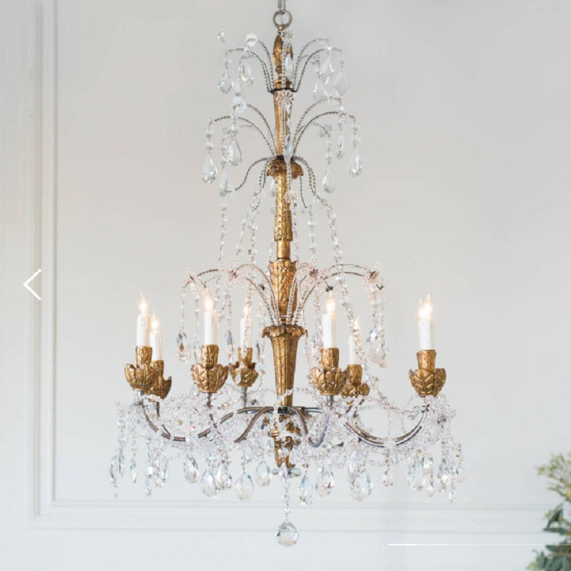 Lueur d’Automne rustic chandelier with grapevine arms and crystal clusters in a farmhouse dining room