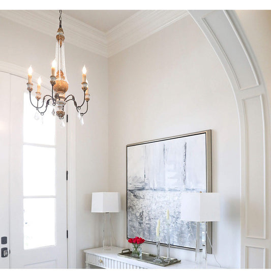 Crystal dewdrop refractions casting prismatic light in a country dining space