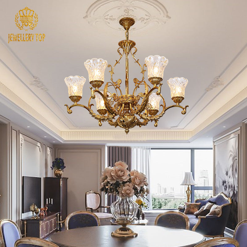 Artistic brass detailing highlighting classic elements of vintage gold chandelier.