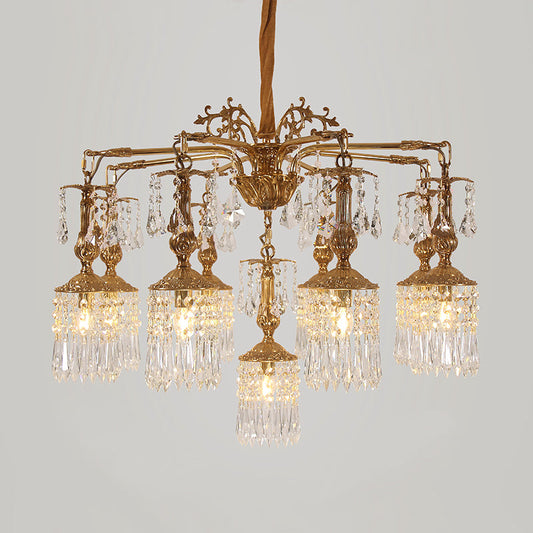 Classical brass chandelier showcasing sparkling crystal details.