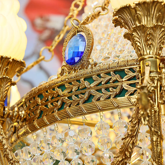 Close-up of brass detailing on the empire chandelier