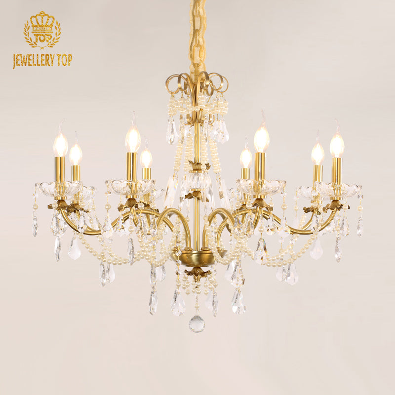 Ornate vintage French chandelier featuring pearl-inspired beads and crystal drops.