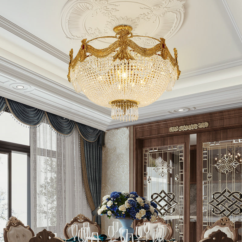 Elegant brass ceiling lamp illuminated, reflecting luxury Renaissance-inspired design.