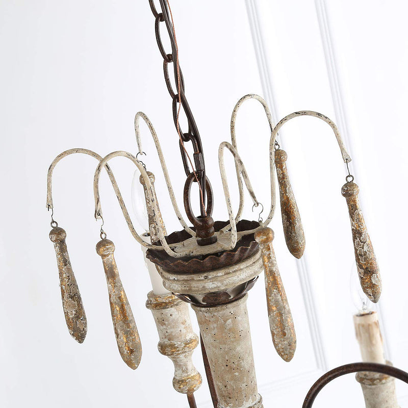 Distressed oak and iron tassel details on vintage farmhouse ceiling fixture