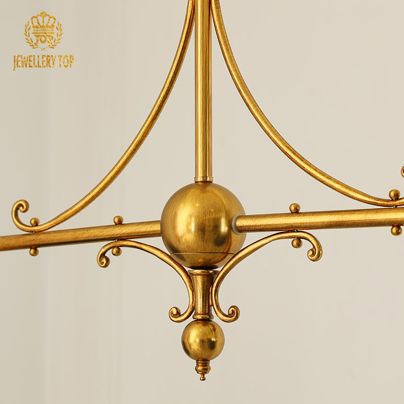 Adjustable brass chain and LED illumination features of dining room fixture