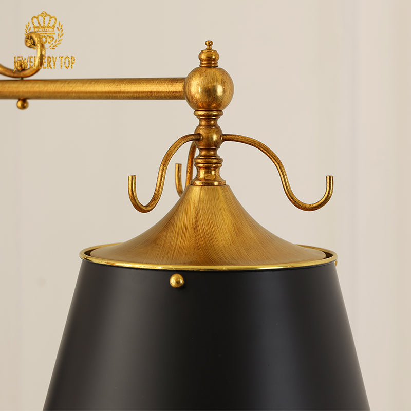 Close-up of 24-karat gold leaf lining inside noir metal lantern shades
