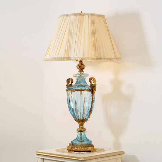 Artistic angle of the Luminous Heritage Vintage Table Lamp highlighting fabric accents
