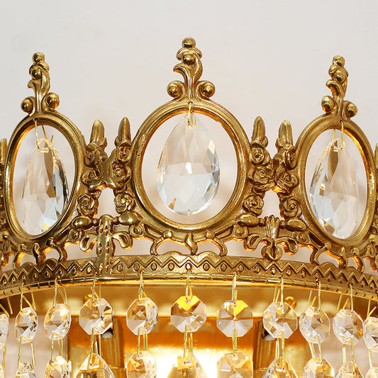 Close-up of brass crown detailing with oval crystal windows