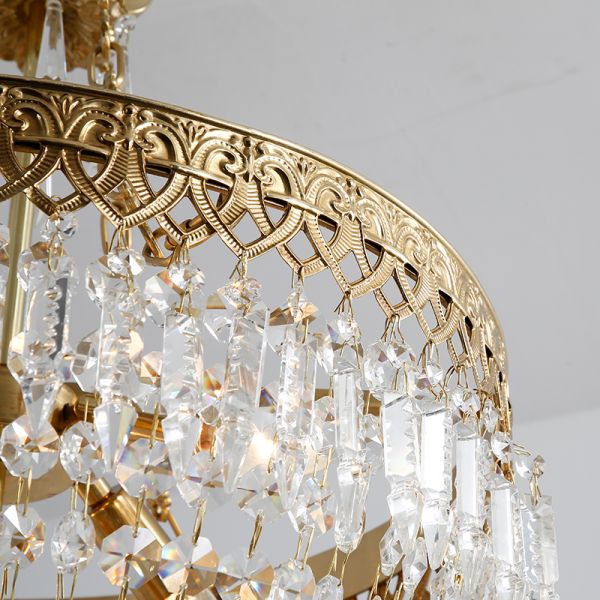 Detailed brass and crystal accents on the vintage pendant light