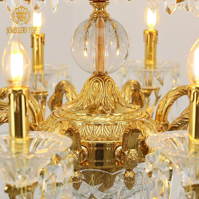 Close-up view of the brass and crystal elements of a vintage French chandelier