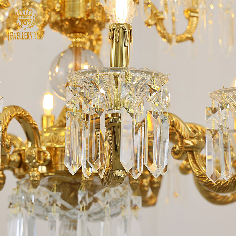 Rococo chandelier with ornate brass accents and luxurious crystal drops