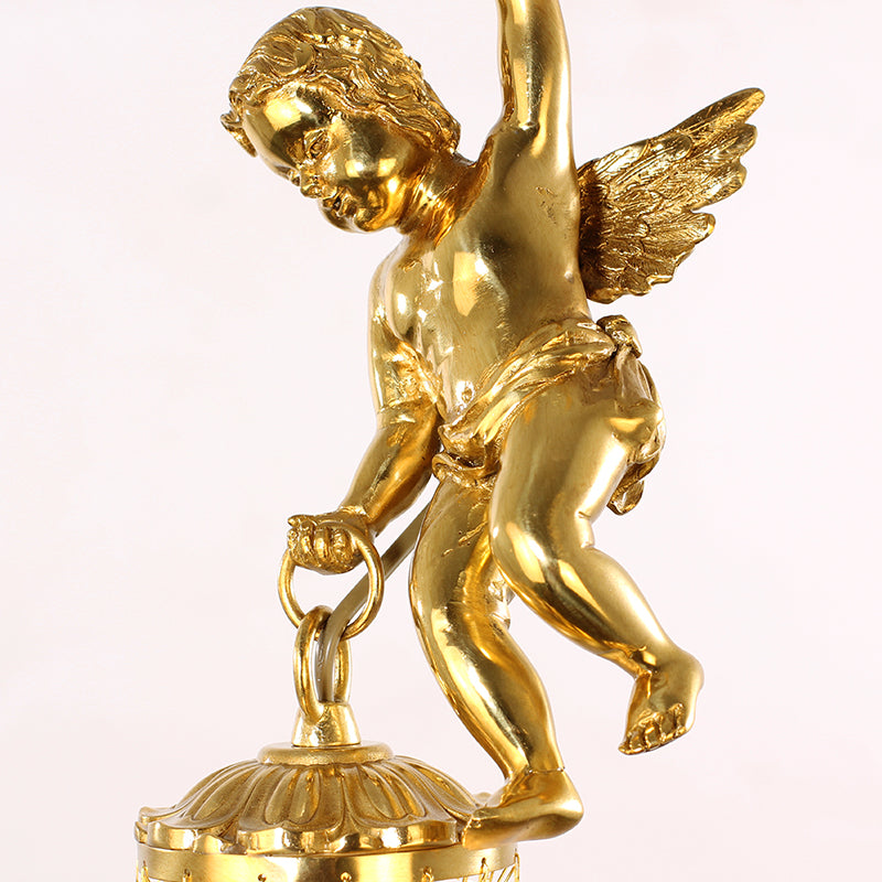 Close-up of Parisian Cupid French Pendant Light’s brass detailing