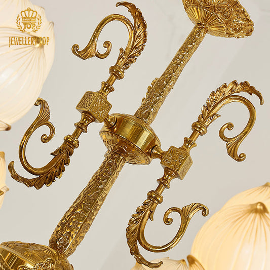 Elegant frosted glass shade atop a vintage lamp arm with mythological design.