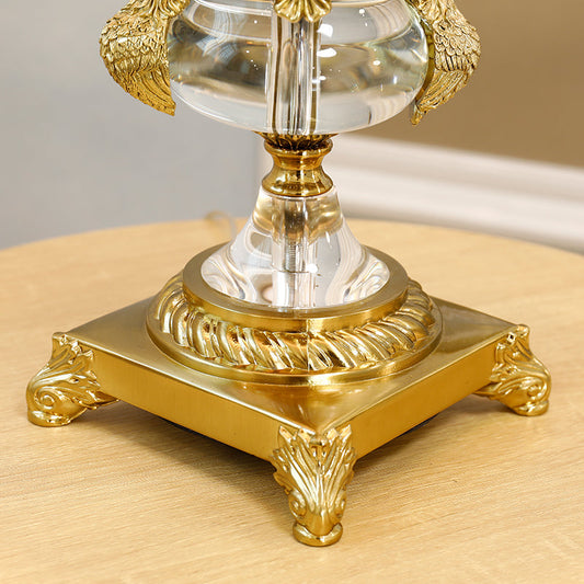 Detailed brass phoenix head on Phoenix Luminary Crystal Table Lamp