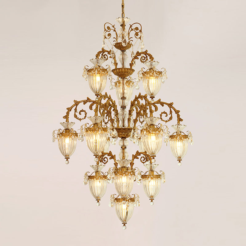 Beautifully illuminated vintage chandelier glass showcasing refined brass craftsmanship and crystal detailing.