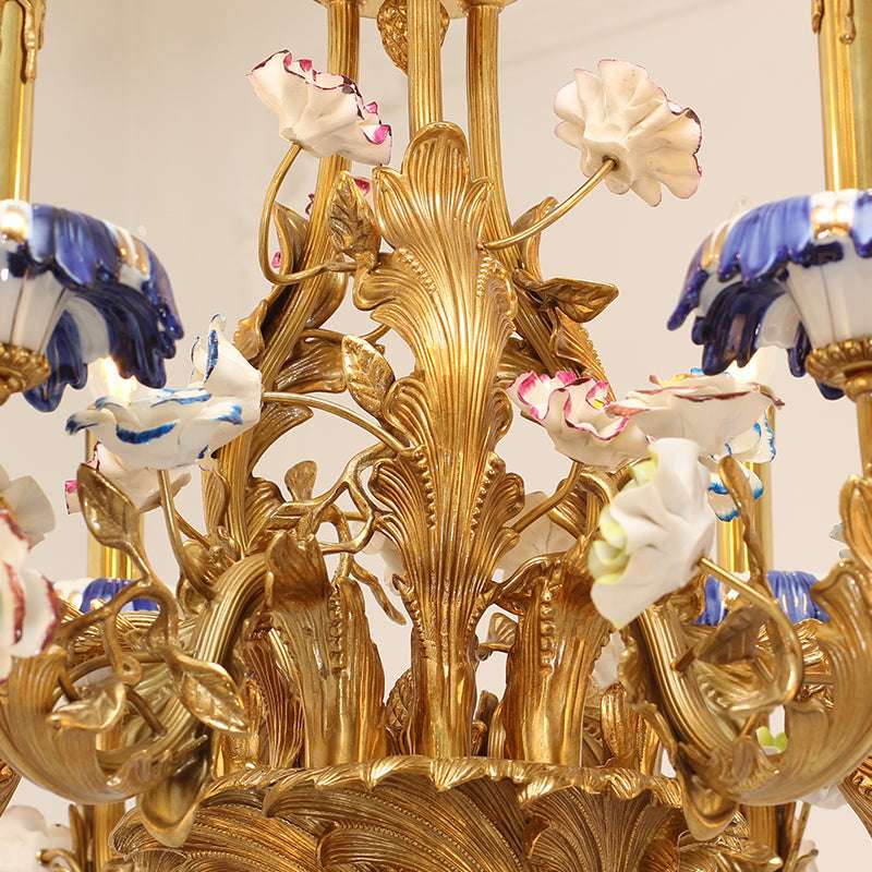 Six-arm floral chandelier illuminating interior with botanical design