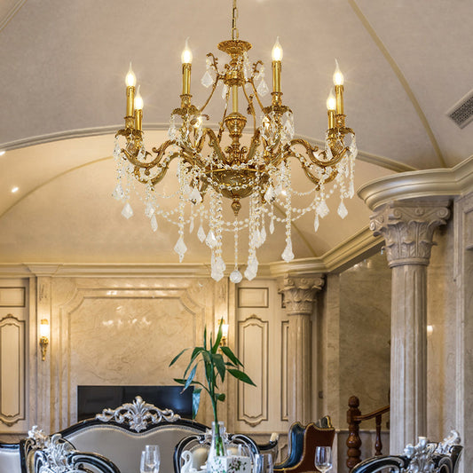 French-inspired chandelier, enhancing the ambiance of a classic living space with golden glow and crystal brilliance.