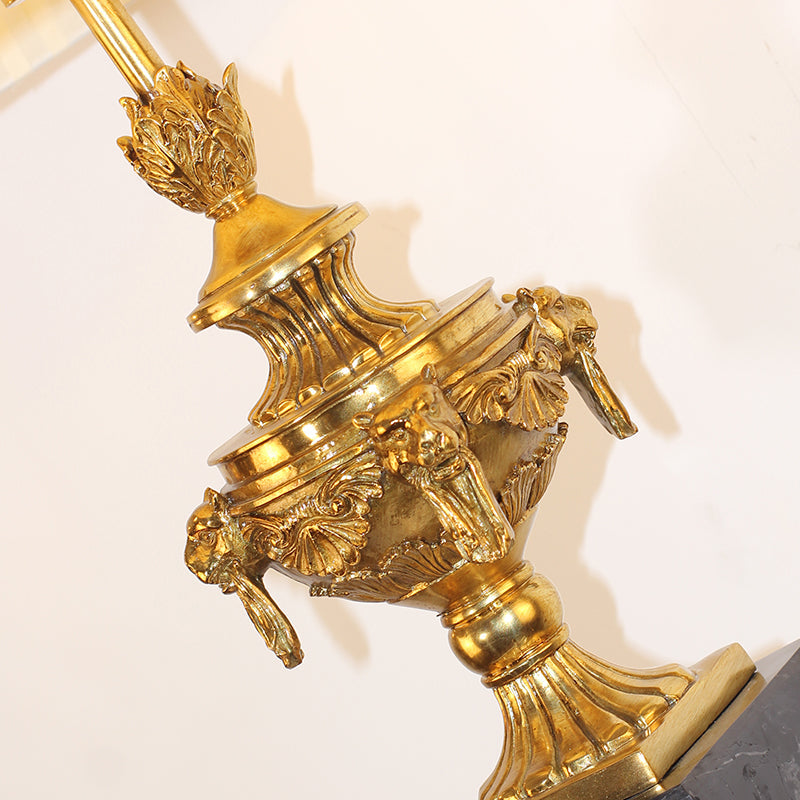 Close-up brass lion details on Versailles Majesty Vintage Table Lamp