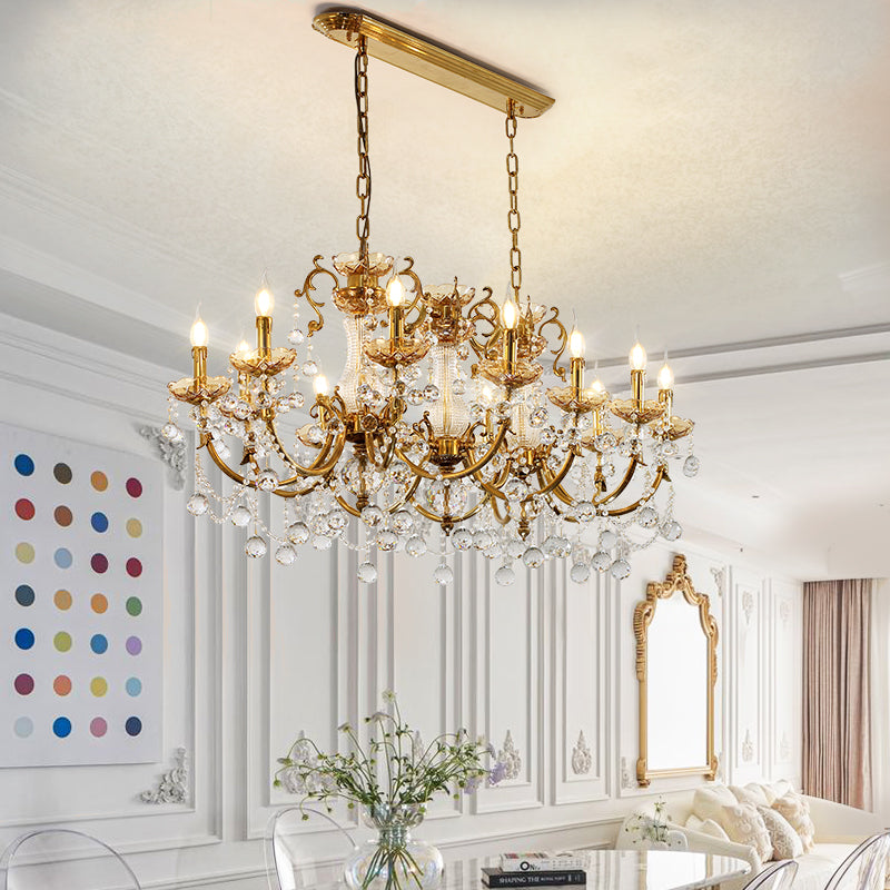 Luxurious Victorian chandelier illuminating a formal dining room.