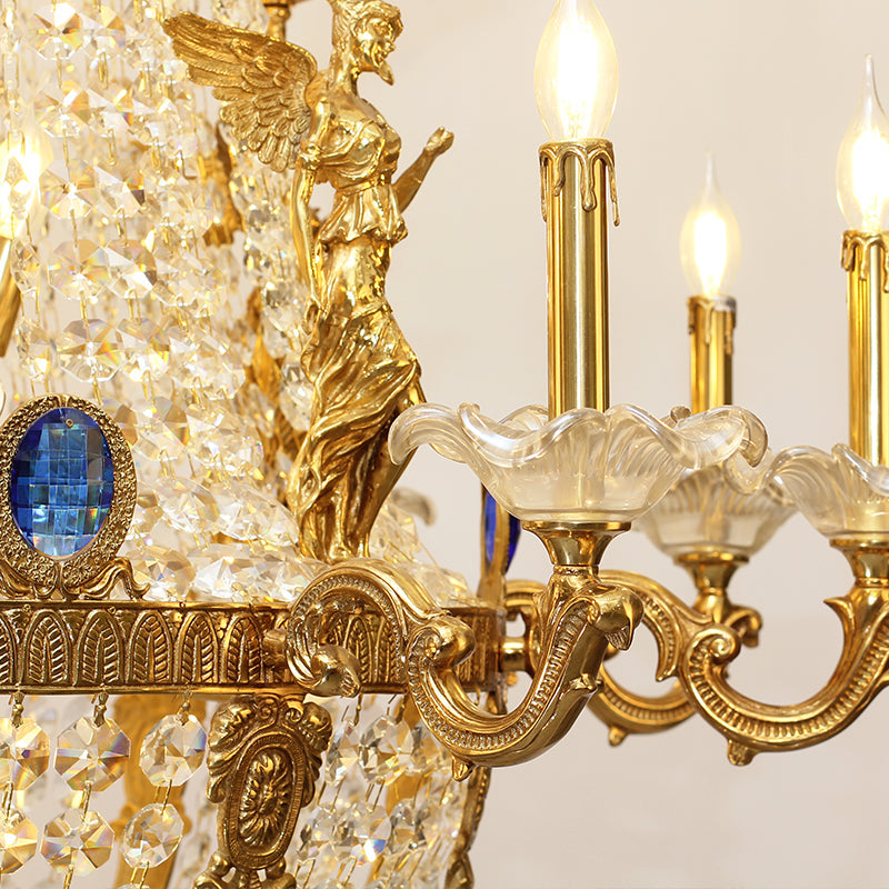 Elegant Victorian style chandelier with sapphire blue accents and brass arms, designed for grand interiors.