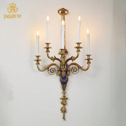 Versailles-style brass wall sconce with blue enamel detailing